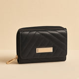 Freccia Compact Purse — Cuovelle studio shot